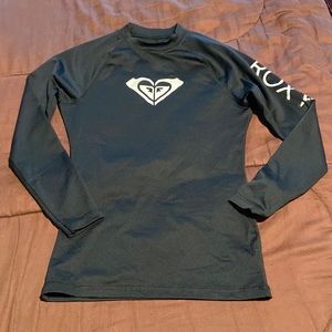 Rashguard Top by Roxy Brand.